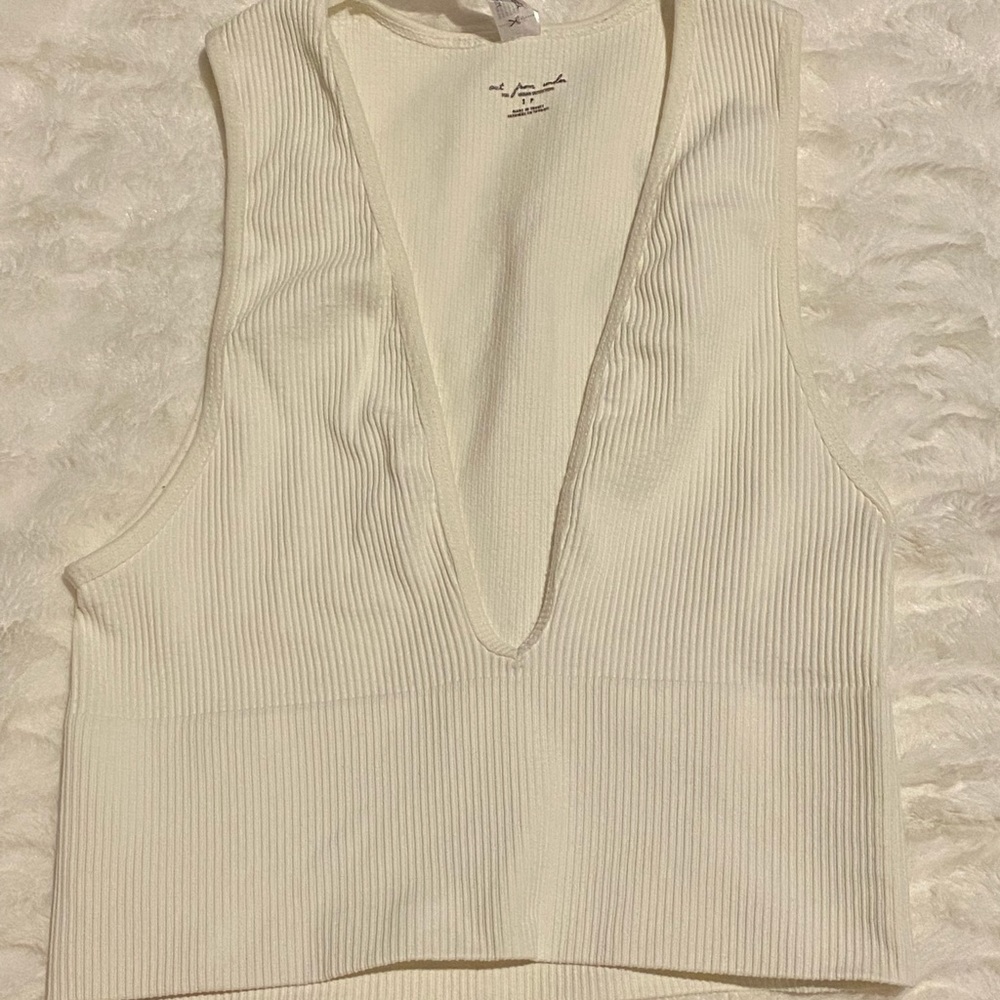 Urban outfitters out from under white tank